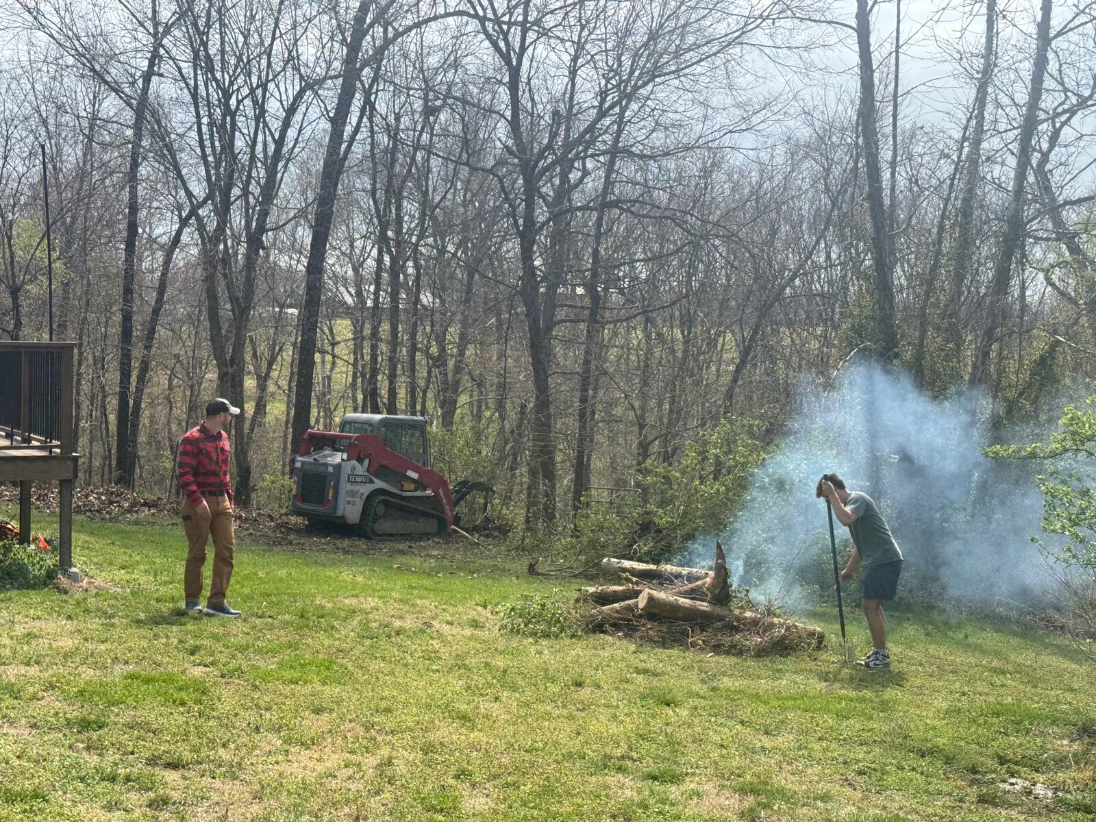 GHR skid steer and brush pile cleanup