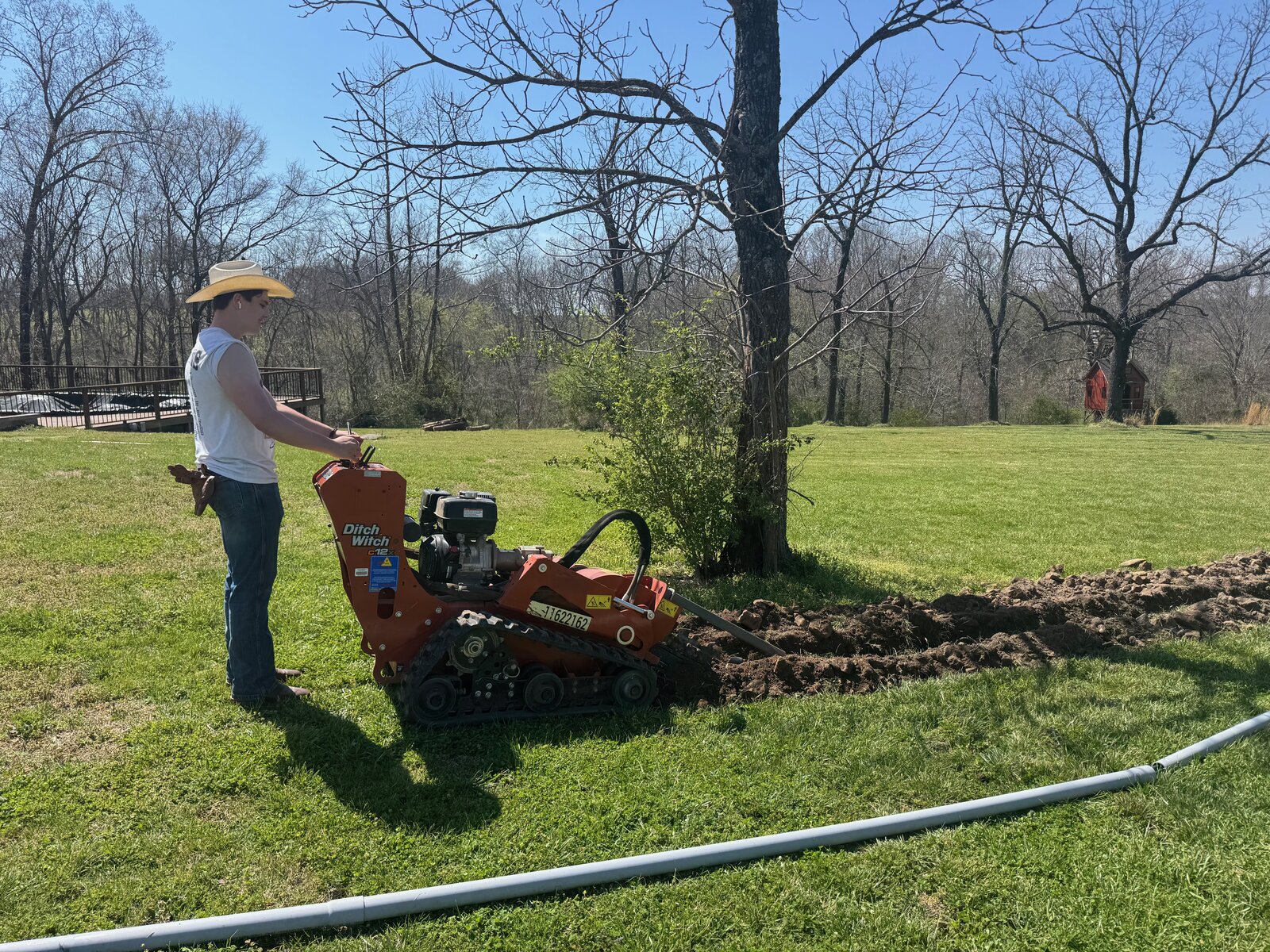 GHR trencher digging a utility line trench